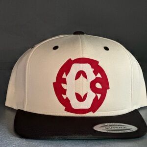 Cream and Black Cultura Snapback Cap with Red Logo